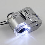 Silverfärgat 60x förstoringsglas med inbyggd LED-belysning