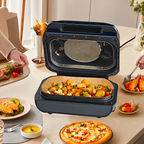 Brun pappersinsats placerad i en airfryer med grönsaker